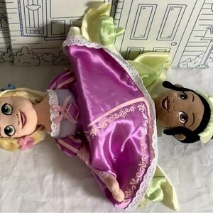 A Disney Parks Princess Rapunzel and Tiana Topsy Turvy Reversible Flip Doll.